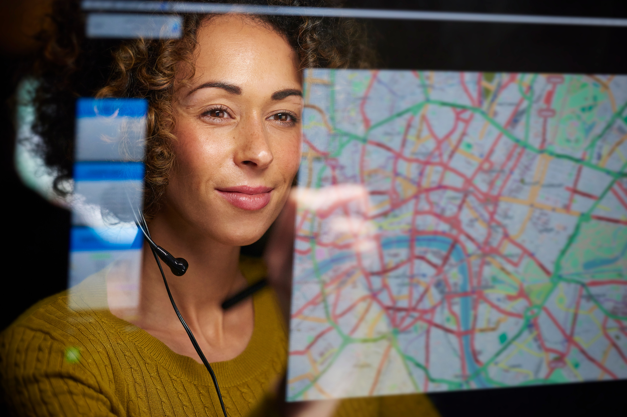 Team member in headset coordinating tasks—efficient dispatching